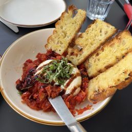 Burrata & Roasted Tomatoes ($16) - pretty good but not enough bread. Thankfully our server gave us extra!