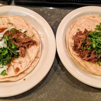 Bar.bacoa - Lamb Barbacoa Taco (left) and Beef Barbacoa Taco (right). - Spanish Near Me - Atlanta, Georgia Bar.bacoa - Lamb Barbacoa Taco (left) and Beef Barbacoa Taco (right). - Spanish Near Me - Atlanta, Georgia