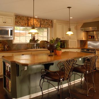 Nicholas General Contracting - a kitchen with a center island - Carpenters Near Me
