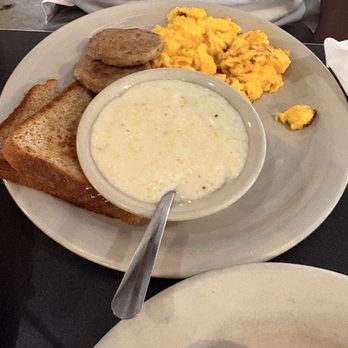 Atlanta Breakfast Club - Pork sausage, fried eggs, grits, and toast - Southern Near Me - Atlanta, Georgia Atlanta Breakfast Club - Pork sausage, fried eggs, grits, and toast - Southern Near Me - Atlanta, Georgia