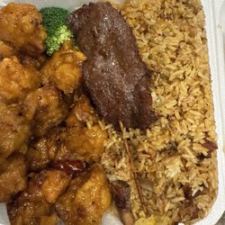 Li's Asian Gourmet - Reheated and greasy pork fried rice, undercooked beef teriyaki and reheated General Tso's.