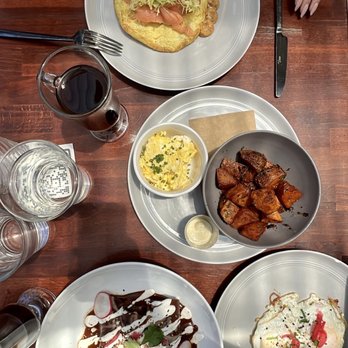 Benchmark - Mole Chicken enchiladas, potatoes and Spanish omelet - New American Near Me - Santa Ana, California