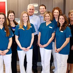 Veenstra Family Dental - The doctors with the staff