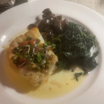 Ray's On the River - Sea bass with Sauteed Local Wild Mushrooms and sautéed spinach - Seafood Near Me - Sandy Springs, Georgia Ray's On the River - Sea bass with Sauteed Local Wild Mushrooms and sautéed spinach - Seafood Near Me - Sandy Springs, Georgia