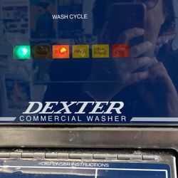 A Laundromat - View of washer machine dashboard.
