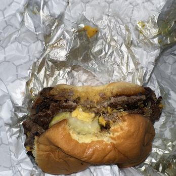 Patty Palace - a hamburger with cheese and pickles - Burgers Near Me - Austin, Texas