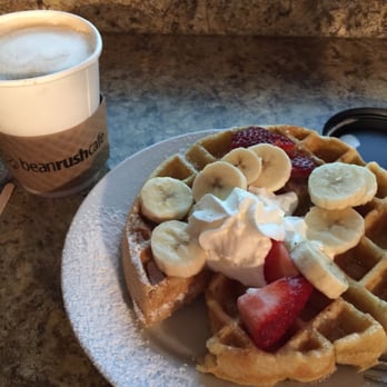 Bean Rush Cafe - Honey Bee Latte & Waffle (minus one bite) - Cafes Near Me - Crownsville, Maryland Bean Rush Cafe - Honey Bee Latte & Waffle (minus one bite) - Cafes Near Me - Crownsville, Maryland