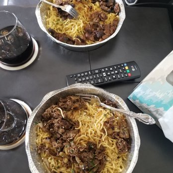 Nguyen's Kitchen - Garlic noodles, AWFUL texture. Soggy and overcooked. Looks nothing like the business photos, bleh! - Vietnamese Near Me - Orange, California