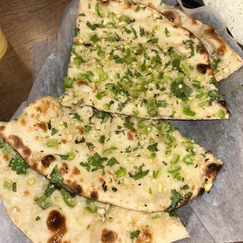 Grand India - CHILLI GARLIC NAAN - Indian Near Me - Salem, New Hampshire Grand India - CHILLI GARLIC NAAN - Indian Near Me - Salem, New Hampshire