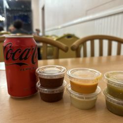 Panaderia Los Arcos - Orange and white salsas are new!! They're extra spicy and extra delicious
