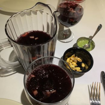 Sol Inca - a pitcher of wine and a bowl of fruit - Peruvian Near Me - Jackson Heights, New York Sol Inca - a pitcher of wine and a bowl of fruit - Peruvian Near Me - Jackson Heights, New York