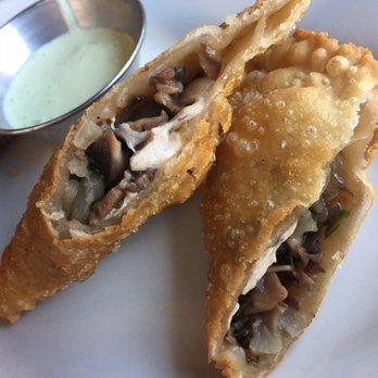 Puerto Viejo - Cross section of the empanadas - Dominican Near Me - Brooklyn, New York