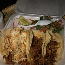 Two chicken and two Al Pastor tacos