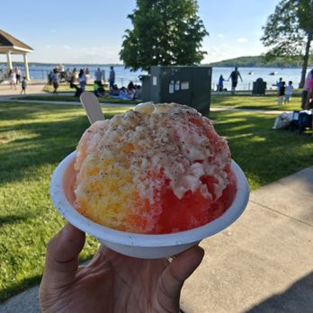 Malini Bikini - POG - passion fruit, orange, and guava topped with sweet cream and li-hing mui powder - Shaved Ice Near Me - Lake Geneva, Wisconsin Malini Bikini - POG - passion fruit, orange, and guava topped with sweet cream and li-hing mui powder - Shaved Ice Near Me - Lake Geneva, Wisconsin