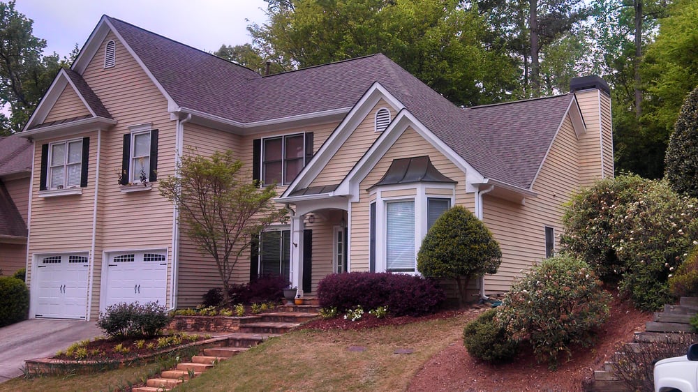 Slide of ATL Roofing Pros