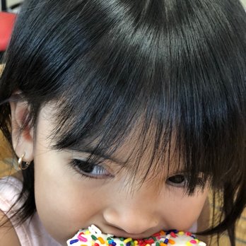 Shipley Do-Nuts - a little girl eating a donut - Donuts Near Me - Hattiesburg, Mississippi Shipley Do-Nuts - a little girl eating a donut - Donuts Near Me - Hattiesburg, Mississippi