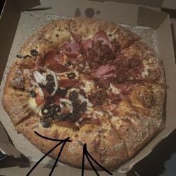Domino's Pizza - Pizza wasn't cut right but homie who cut it was crossed eyed so it's chill