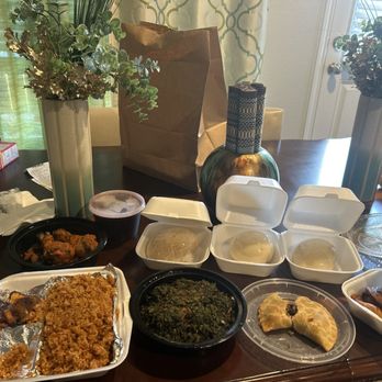 Hunan Cafe - Jollof Rice, Vegetable Soup, meat pie, Fried Plantains, Sauteed Chicken, Fufu, Pounded Yam,  and Eba - African Near Me - Houston, Texas
