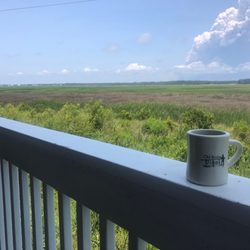 Crossroads Gathering Place - Cup of coffee on the back porch