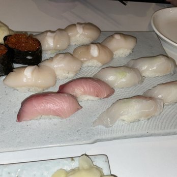 Miku - Ikura, Hotate, Hamachi, and Tai sushi (left to right) - Japanese Near Me - Toronto, Ontario Miku - Ikura, Hotate, Hamachi, and Tai sushi (left to right) - Japanese Near Me - Toronto, Ontario