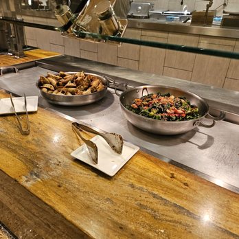 Wicked Spoon - Vegetable Gyoza and Kimchi greens - Buffets Near Me - Las Vegas, Nevada Wicked Spoon - Vegetable Gyoza and Kimchi greens - Buffets Near Me - Las Vegas, Nevada
