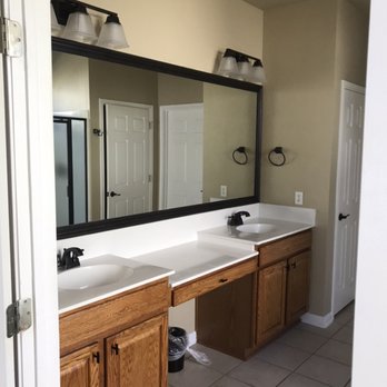 Dreamers Construction & Remodeling - Vanity refinish and mirror framed - Flooring Near Me Dreamers Construction & Remodeling - Vanity refinish and mirror framed - Flooring Near Me