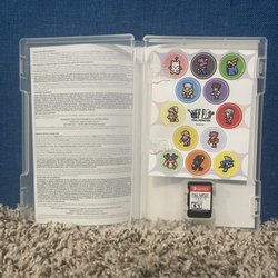 GameStop - Anniversary Edition Character Sticker Sheet and Cartridge