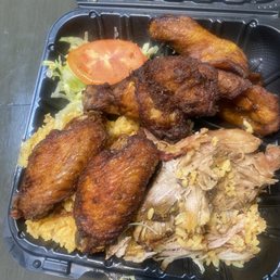 My food after I sampled everything. Half & Half Platter (4 wings & 4 oz Pork) Served With Rice My food after I sampled everything. Half & Half Platter (4 wings & 4 oz Pork) Served With Rice