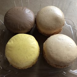 Macaroons. Two vanillas, one lemon, and one chocolate.