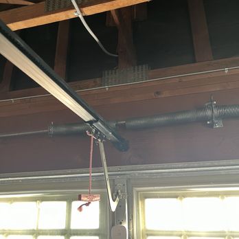 Garage Door Doctor - Our broken spring before Kenji replaced it - Garage Door Services Near Me Garage Door Doctor - Our broken spring before Kenji replaced it - Garage Door Services Near Me