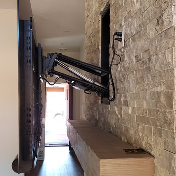 Dixie Cable Tech - MantelMounts premium motorized mount allows for amazing functionality with over-the-fireplace televisions. - Home Theatre Installation Near Me - Washington, Utah Dixie Cable Tech - MantelMounts premium motorized mount allows for amazing functionality with over-the-fireplace televisions. - Home Theatre Installation Near Me - Washington, Utah
