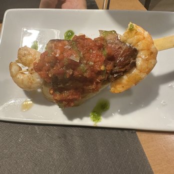 Triku Harri - Shrimp & bacon skewer on toast with tomato sauce - Tapas Bars Near Me - Donostia, SS