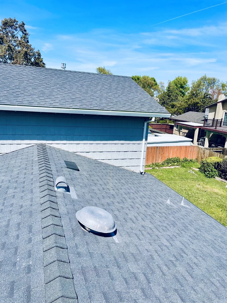 Slide of Ruiz Roofing Service