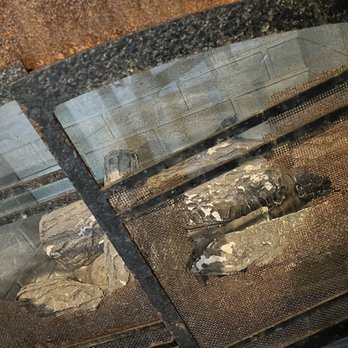 Stoney Creek Hotels - Johnston - Closeup of rusted out fireplace. - Hotels Near Me - Johnston, Iowa Stoney Creek Hotels - Johnston - Closeup of rusted out fireplace. - Hotels Near Me - Johnston, Iowa