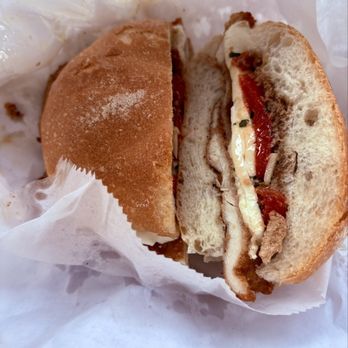 Parisi Bakery - Chicken cutlet, mozzarella, roasted red peppers, balsamic on a large roll. $13.59 with tax. - Bakeries Near Me - New York, New York Parisi Bakery - Chicken cutlet, mozzarella, roasted red peppers, balsamic on a large roll. $13.59 with tax. - Bakeries Near Me - New York, New York
