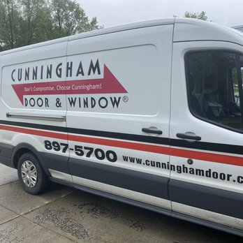 Cunningham Door & Window - a van parked on the side of the road - Garage Door Services Near Me - Louisville, Kentucky Cunningham Door & Window - a van parked on the side of the road - Garage Door Services Near Me - Louisville, Kentucky