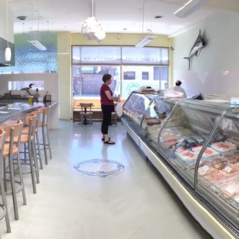 The Fish Guy - Dining on the left - seafood case on the right - Seafood Markets Near Me - Chicago, Illinois