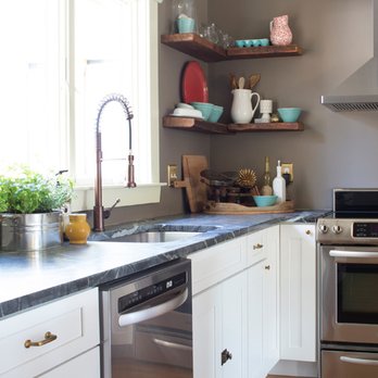 MMP Construction - a kitchen with stainless steel appliances - General Contractors Near Me - Lowell, Massachusetts