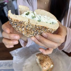 Lemoine Hot Bagels Deli - Fresh, warm everything bagel with scallion cream cheese on a Saturday morning