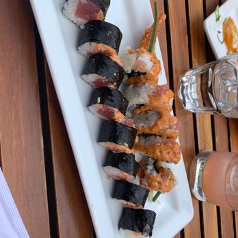 Rockwell Republic - a plate of sushi on a table - New American Near Me - Grand Rapids, Michigan