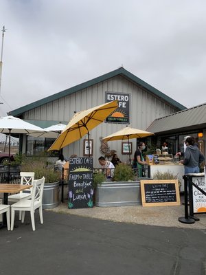 Photo of Estero Cafe - Valley Ford, CA, US. Estero Cafe with outdoor tables along street.