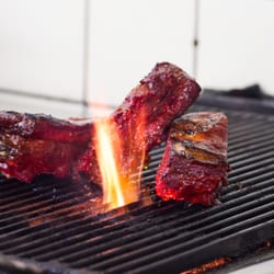 Didong - Geroosterde Babi Pangang van het Livar varken, Indonesisch restaurant Didong