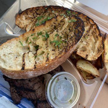 Urban Plates - Chimichurri Grass Fed Steak with roasted potatoes and an extra bread - Salad Near Me - Pasadena, California Urban Plates - Chimichurri Grass Fed Steak with roasted potatoes and an extra bread - Salad Near Me - Pasadena, California