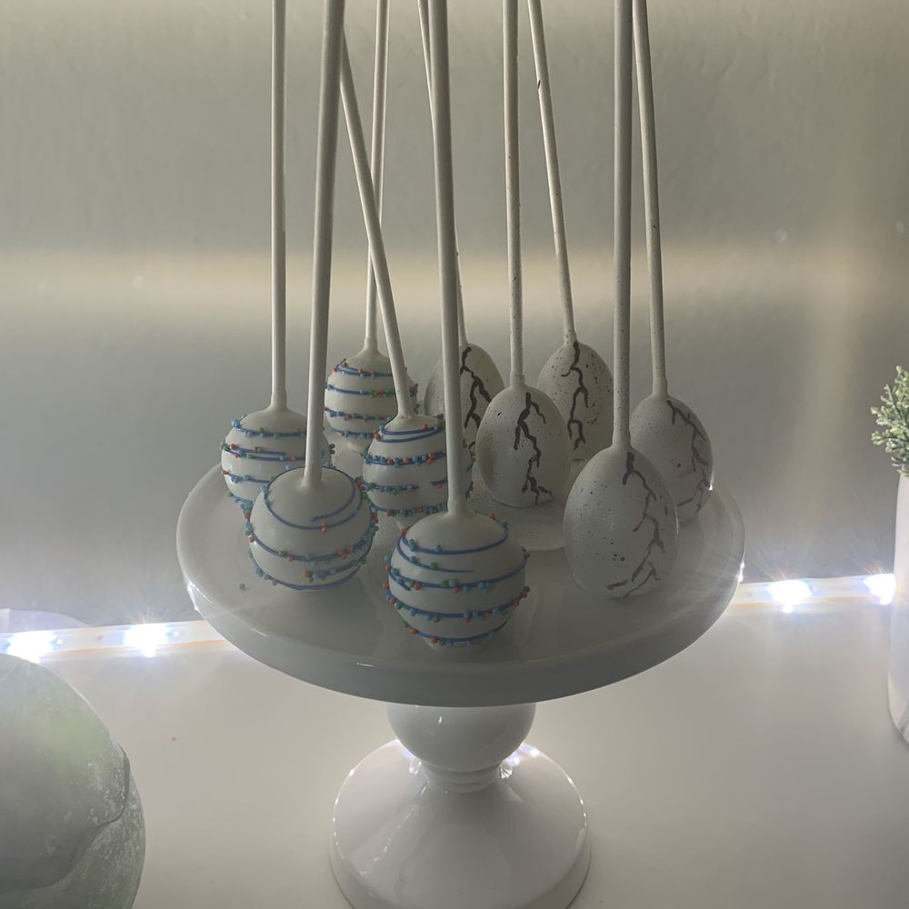 Tiffany's Cake Poppery - Simple cake pop and dinosaur egg. - Bakeries Near Me Tiffany's Cake Poppery - Simple cake pop and dinosaur egg. - Bakeries Near Me