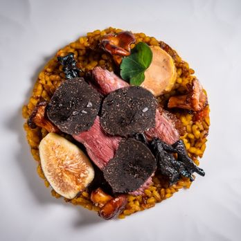 Xiquet by Danny Lledó - PAELLA DE CAÇADOR
Smoked duck breast, black trumpets, chanterelles, foie torchon, figs - Spanish Near Me - Washington, DC, District of Columbia Xiquet by Danny Lledó - PAELLA DE CAÇADOR
Smoked duck breast, black trumpets, chanterelles, foie torchon, figs - Spanish Near Me - Washington, DC, District of Columbia