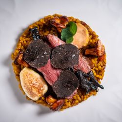 Xiquet by Danny Lledó - PAELLA DE CAÇADOR
Smoked duck breast, black trumpets, chanterelles, foie torchon, figs