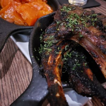 Taste Bar + Kitchen - Jerk lamb chop, collard greens and yams, finger licking good!!! - Cocktail Bars Near Me - Houston, Texas Taste Bar + Kitchen - Jerk lamb chop, collard greens and yams, finger licking good!!! - Cocktail Bars Near Me - Houston, Texas