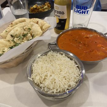Sanjh Indian Kitchen & Bar - Chicken Tikka Masala and rosemary basil Naan - Indian Near Me - Riviera Beach, Florida Sanjh Indian Kitchen & Bar - Chicken Tikka Masala and rosemary basil Naan - Indian Near Me - Riviera Beach, Florida