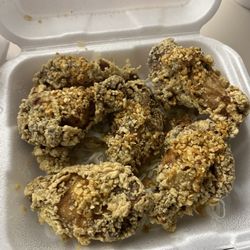 Nom Nom Noodles - House garlic wings, a tad over fried no?