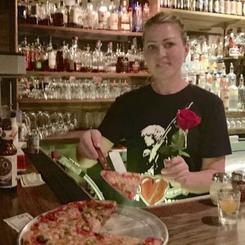 PS Lounge - The PS Lounge Bartender presenting pizzz & a free rose - Dive Bars Near Me - Denver, Colorado